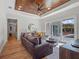 Comfortable Gathering room featuring wood floors, access to outdoor pool, and plenty of seating at 340 Lakeview Rd, Winter Garden, FL 34787