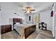 Bedroom featuring neutral walls, fan and nice natural light from the window at 384 Old Alemany Pl, Oviedo, FL 32765