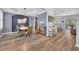 Bright and airy dining room showcasing hardwood floors and a stylish light fixture at 384 Old Alemany Pl, Oviedo, FL 32765