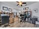 Functional office space featuring hardwood floors, neutral paint and ample workspace at 384 Old Alemany Pl, Oviedo, FL 32765