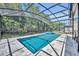 Screened-in pool and spa area with brick pavers and access to the outdoor living spaces at 384 Old Alemany Pl, Oviedo, FL 32765