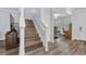 Staircase with wood stairs leading to the second floor at 384 Old Alemany Pl, Oviedo, FL 32765