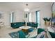Inviting living room featuring stylish seating, modern decor, and bright, open space at 4363 Scene Ln, Kissimmee, FL 34746