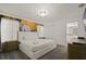 Serene bedroom features a waterfall mural, plush carpet, and ensuite bathroom access at 4363 Scene Ln, Kissimmee, FL 34746