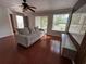 The open living room provides an abundance of light and plenty of space for furniture at 4756 Walden Cir # 21, Orlando, FL 32811