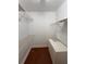 Walk-in closet featuring shelving and a dresser at 4756 Walden Cir # 21, Orlando, FL 32811