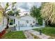 Relaxing backyard with a tiled patio, grill, and lots of seating for entertaining outdoors at 50989 Highway 27 # 176177, Davenport, FL 33897