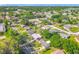 An aerial perspective of a neighborhood with lush trees and well-maintained streets at 514 S Cottage Hill Rd, Orlando, FL 32805