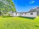 The home features a spacious backyard and plenty of room to play at 514 S Cottage Hill Rd, Orlando, FL 32805