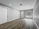 Empty living room with light-colored walls, modern flooring, and lots of natural light at 514 S Cottage Hill Rd, Orlando, FL 32805