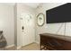 Entryway with a white front door, light gray walls, and tile floors at 519 Beasley Ct, Orlando, FL 32807