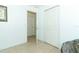 Hallway featuring a closet, doorways, and tiled flooring at 519 Beasley Ct, Orlando, FL 32807