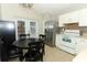 Kitchen featuring an eat in dining area and stainless steel appliances at 519 Beasley Ct, Orlando, FL 32807