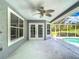 Enclosed patio with a refreshing swimming pool at 5311 Saddleback Ct, Lady Lake, FL 32159