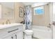 Bathroom featuring a bathtub, shower with patterned curtain, and a modern vanity with storage at 563 Midway Trak # K102, Ocala, FL 34472