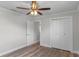 This bedroom featuring neutral paint and ceiling fan at 588 Highway 630 E, Frostproof, FL 33843