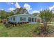 Charming single-story home with lush landscaping and inviting curb appeal at 588 Highway 630 E, Frostproof, FL 33843