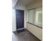 A secure entrance with digital lock and unit number 116 is adjacent to a window at 6108 Curry Ford Rd # 116, Orlando, FL 32822