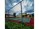 Community tennis court offers a space for recreation and athletic activities at 6108 Curry Ford Rd # 116, Orlando, FL 32822