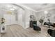 Elegant foyer with modern chandeliers, light wood floors, and stylish decor, creating a welcoming ambiance at 6426 Montclair Bluff Ln, Windermere, FL 34786