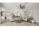 Open-concept living room with modern furnishings and seamless kitchen access at 6426 Montclair Bluff Ln, Windermere, FL 34786