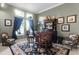 Entertain in style with this bar, complete with seating and decorative accents, creating a perfect space for relaxation at 9019 Tower Pine Dr, Winter Garden, FL 34787