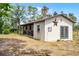 Picturesque barn with star detail provides a rustic charm in a tranquil country setting at 9019 Tower Pine Dr, Winter Garden, FL 34787