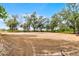 Large equestrian arena with well-maintained sand, ideal for training and riding at 9019 Tower Pine Dr, Winter Garden, FL 34787