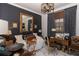 Stylishly decorated bedroom featuring a large mirror, eclectic furnishings, and custom window coverings at 907 Sussex Close # 4, Orlando, FL 32804