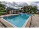 Spacious community pool with poolside lounge area and clubhouse, providing a perfect spot for relaxation and recreation at 907 Sussex Close # 4, Orlando, FL 32804