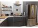 Modern kitchen with stainless steel refrigerator, sleek countertops, and stylish decor at 907 Sussex Close # 4, Orlando, FL 32804