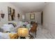 Elegant living room with stylish decor, marble floors, and an open layout at 907 Sussex Close # 4, Orlando, FL 32804
