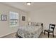 Comfortable bedroom with natural light and a calm color palette at 11006 Sound Shore Dr, Winter Garden, FL 34787