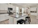 Modern kitchen boasting granite countertops, stainless appliances, and a breakfast bar with seating at 11006 Sound Shore Dr, Winter Garden, FL 34787