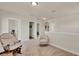 Upstairs living room with neutral tones and natural lighting that creates a relaxing atmosphere at 11006 Sound Shore Dr, Winter Garden, FL 34787