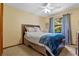 Comfortable bedroom featuring a ceiling fan and bright window at 1032 Silcox Branch Cir, Oviedo, FL 32765