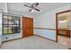 Cozy bedroom featuring natural light from window with a closet with folding doors at 1032 Silcox Branch Cir, Oviedo, FL 32765