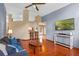 Bright and airy living room with modern furniture, hardwood floors, and an open floor plan at 1032 Silcox Branch Cir, Oviedo, FL 32765