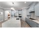 Beautiful kitchen features a large island with seating, stainless steel appliances and ample cabinet space at 1035 Stoney Creek Dr, Lakeland, FL 33811