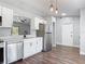 Beautiful kitchen with stainless steel appliances, quartz countertops, and new cabinets at 1089 Algoma St, Deltona, FL 32725