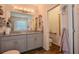 Bright bathroom with double sinks, ample counter space, and separate toilet room at 13940 Magnolia Ridge Loop, Winter Garden, FL 34787