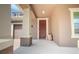 Welcoming covered porch featuring neutral colors and ample space at 13940 Magnolia Ridge Loop, Winter Garden, FL 34787