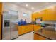 Functional kitchen area featuring stainless steel appliances and granite countertops at 13940 Magnolia Ridge Loop, Winter Garden, FL 34787