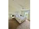 Neutral bedroom featuring carpet, ceiling fan, window with natural light, and beach themed wall decor at 14117 Larkspur Lake Dr, Winter Garden, FL 34787