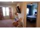 Bright bedroom, with carpet and access to an additional bedroom at 14117 Larkspur Lake Dr, Winter Garden, FL 34787