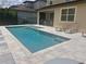 Beautiful pool with lounge chairs and outdoor patio area, perfect for relaxing and entertaining guests at 14117 Larkspur Lake Dr, Winter Garden, FL 34787