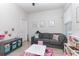 Bright bedroom filled with natural light offers space for learning, playing, and relaxing at 14215 Lakeview Park Rd, Winter Garden, FL 34787