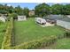 Spacious backyard featuring a shed, RV parking, and a fenced-in area, offering plenty of room at 15650 Catherine Cir, Groveland, FL 34736