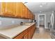 Spacious kitchen featuring ample counter space and stainless steel appliances at 15650 Catherine Cir, Groveland, FL 34736