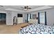 Large main bedroom featuring a ceiling fan, dressers and carpeted floors at 15650 Catherine Cir, Groveland, FL 34736